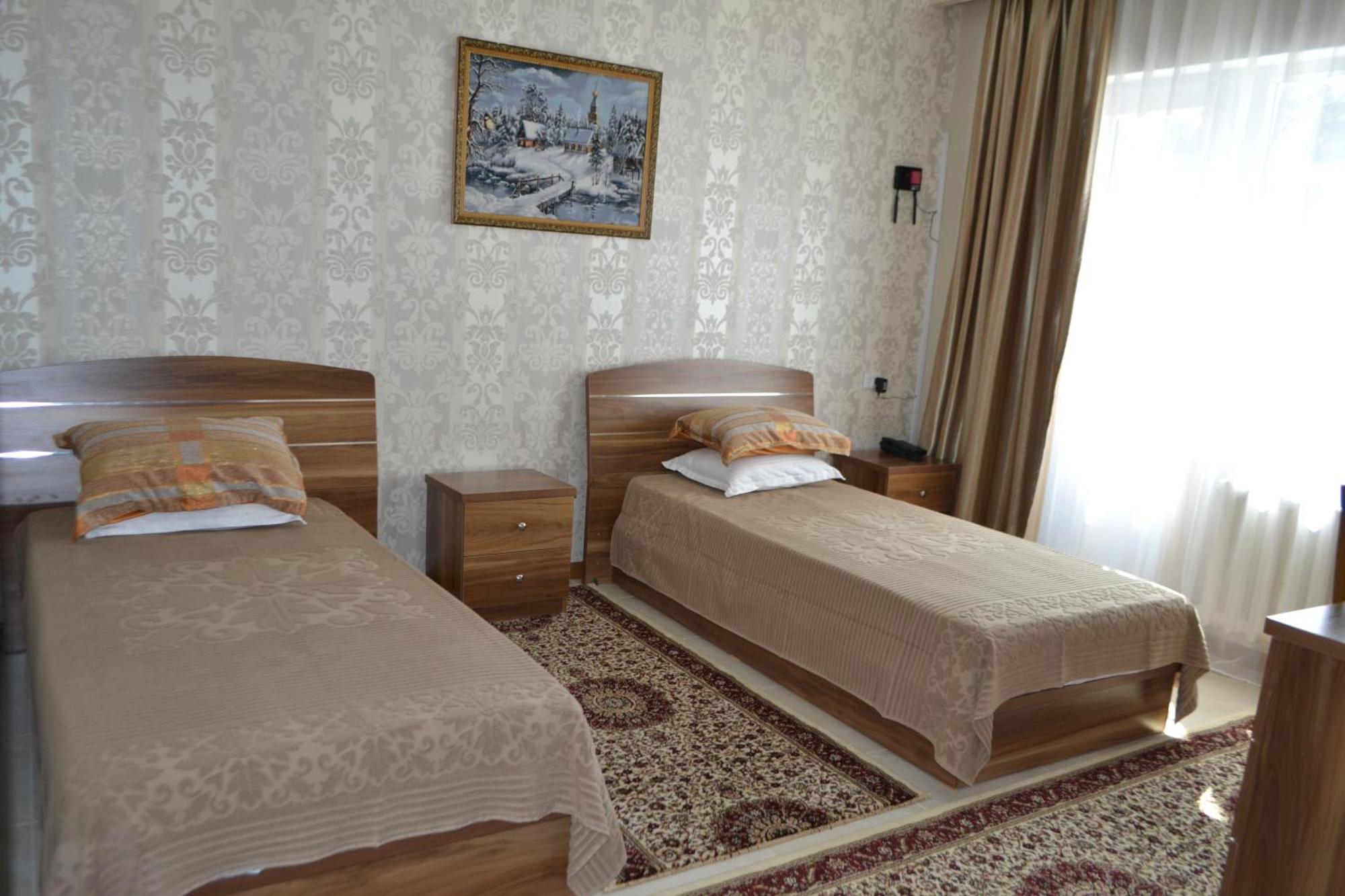 Hotel Gostinitsa Grand Kyzylorda Habitación foto